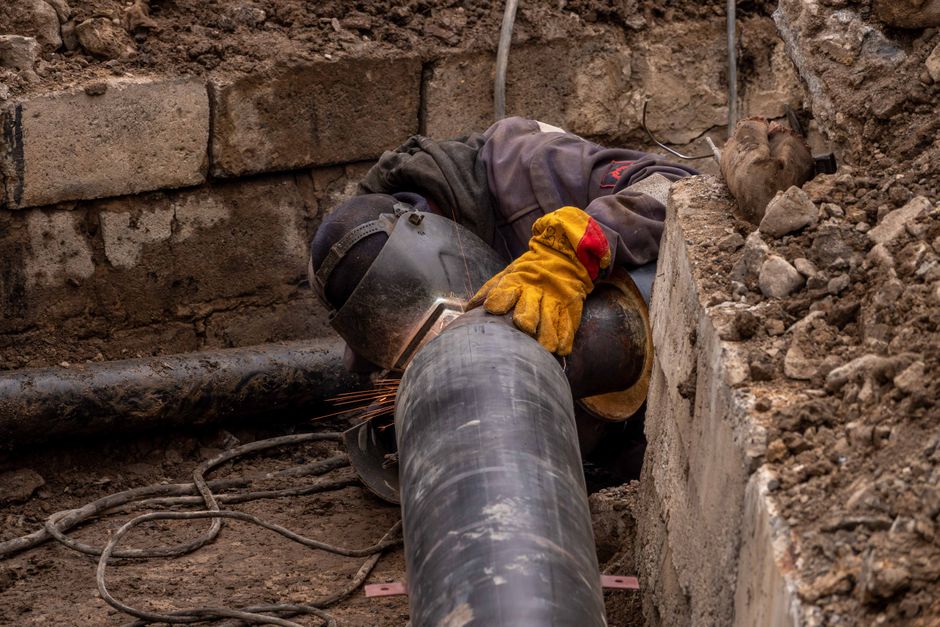 Close-up of a Mansfield drain pipe being inspected for repairs